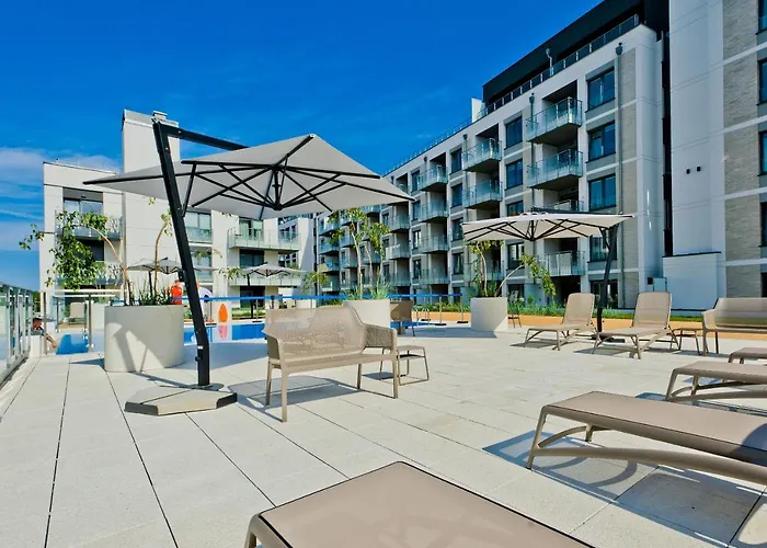 Апартаменты Porty B103 Nadmorskie Tarasy Pool Sauna Parking Колобжег
