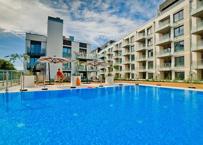 Апартаменты Porty B103 Nadmorskie Tarasy Pool Sauna Parking Колобжег